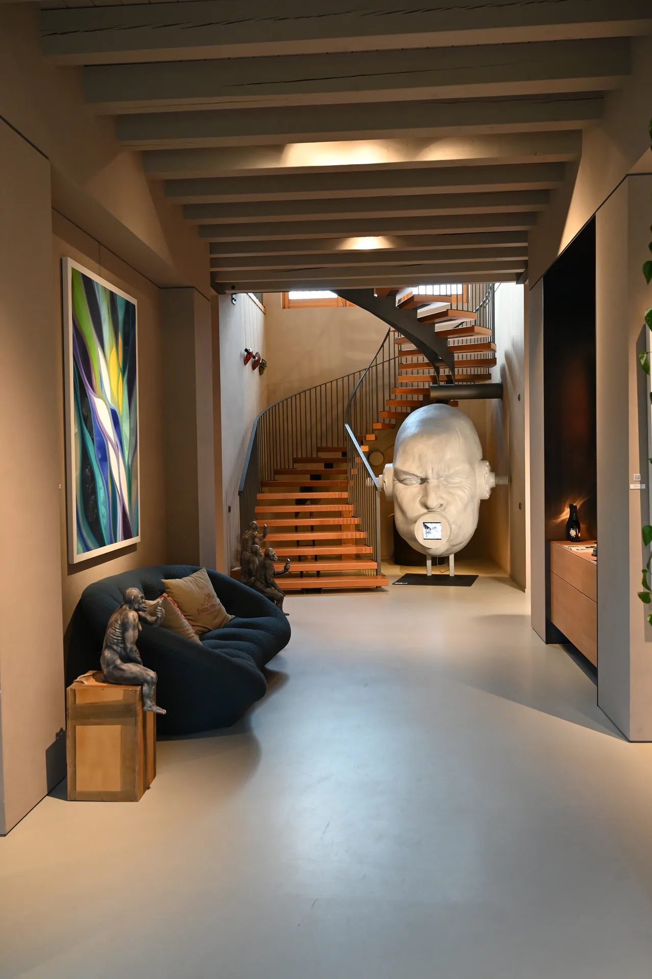 Winery interior with sculptures and contemporary art