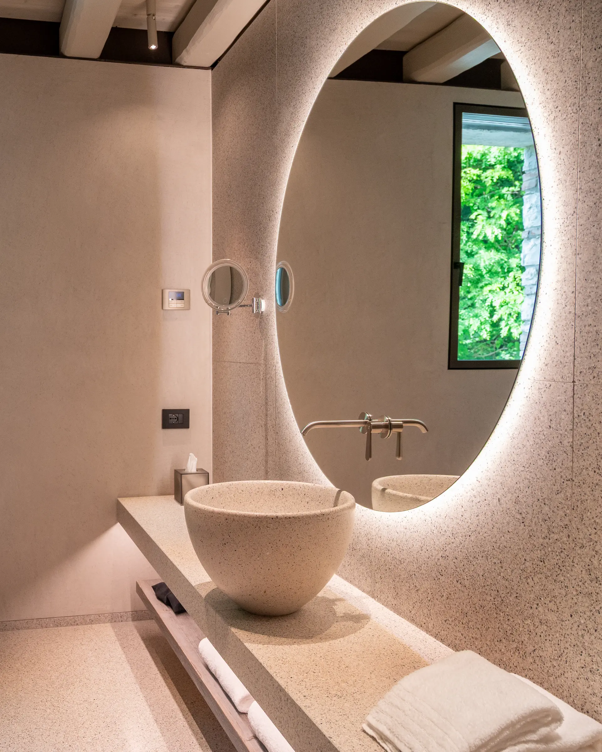 Suite — bathroom with private hammam, backlit mirror and basin in Venetian seminato at Borgo Taurino